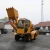Import 3m3 self loading mobile concrete mixer with front end loader from China