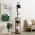 Import Bamboo Original Creative Bedroom Living Room Wood Coat Rack with Flower Display Shelf Shoe Rack from China