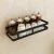 Import Black paint punch free installation stainless steel wall hanging spice rack multi sizes spice bottle organizer from China