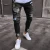 Import Europe and the United States skinny pants badge jeans men Trendy knee hole biker jeans low cheap price man jeans Denim from China