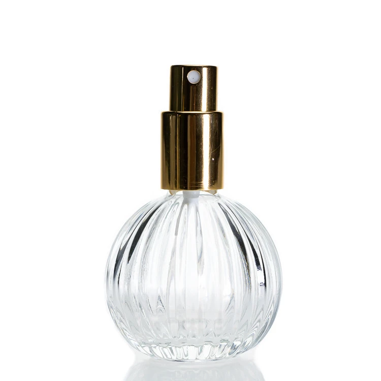 Manufacturer Perfume Bottles 50ml Round Ball Embossed Crystal Perfume Glass Bottle with Pump Spray