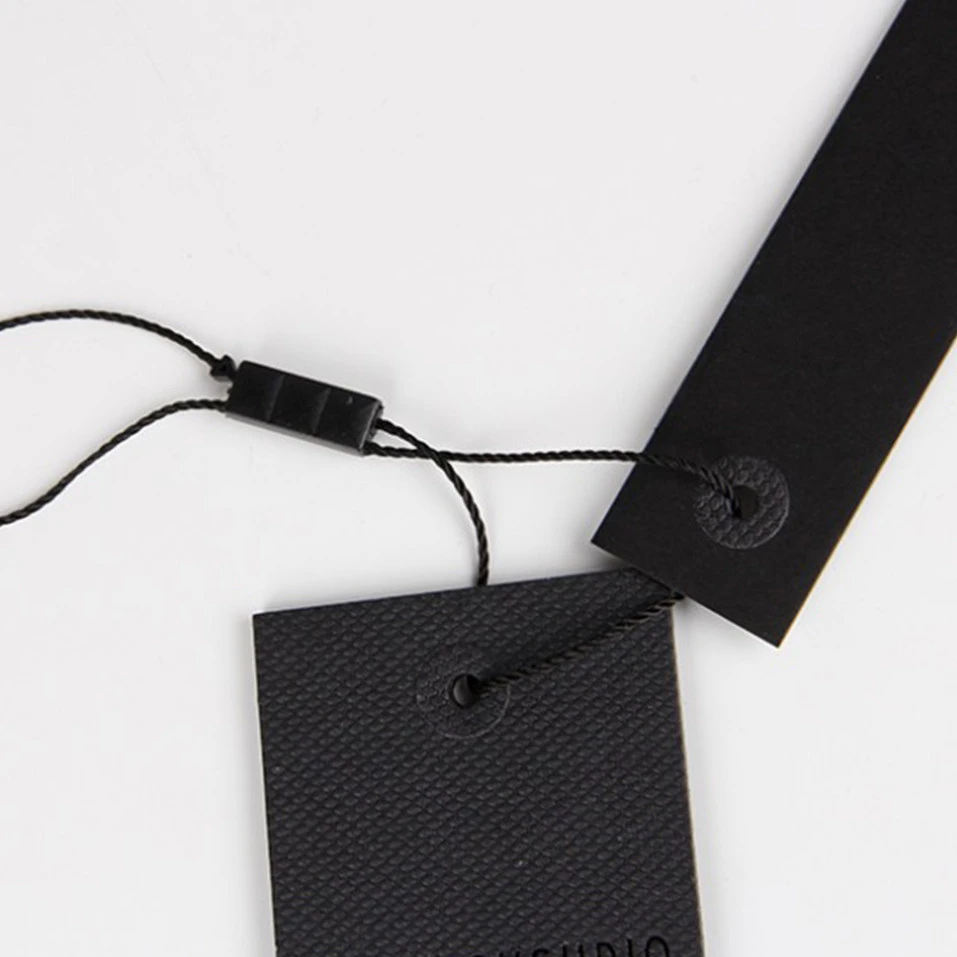 Thin and long black cardboard hang tags for bottles plastic tag fastener