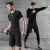 Import Wholesale new fitness clothing four-piece men&#x27;s outdoor running clothing slimming quick dry fitness exercise suit from China