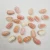 Import Wholesale OEM Mother of Pearl Natural Pink SeaShell 11x19 mm Peanut Carved with hole loose Beads Queen Conch for Jewelry making from China