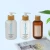 Import 200ml 250ml 300ml 300ml 500ml white plastic shampoo pump bottle with bamboo from China