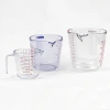 47152 2-Cup glass Measuring Cup with Red Graphics