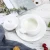Import Cheap plain white reusable porcelain stew pot custom printed promotional wholesale ceramic cooking pot set from China