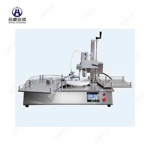 cosmetics packaging machinery full automatic desktop peristaltic filling machine star wheel filling integrated with cappe