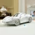 Import Creative design white car shape nordic luxury ceramic crafts table decoration for porch & office from China