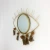 Import Gold metal frame Evil eye shape fancy wall decorative mirror from China