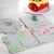 Import High Quality Pulp Board Premium Absorbent Paper Card Coaster / Cup Mat / Cup Pad from China