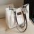 Import Large Capacity Womens Bag 2023 New Spring Premium Small Class Commute Bag Versatile One Shoulder Tote Bag from China