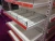 Import Tegometall style supermarket shop store display metal iron shelf shelving rack racking gondola from China