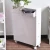 Import wholesale white wooden storage bathroom cabinet with basket drawer from China