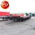 Import 3 axle 100ton lowbed trailer for carry bulldozer with hydraulic folding ramps from China