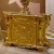 Import baroque expensive wood hand carved royal furniture gold plated bedroom set with red fabric headboard from China