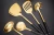 Import Best Kitchen Tools 7pcs Set Black Ceramics Handle Gold Stainless Steel Soup Ladle Spatula Cooking Utensils Set With Metal Rack from China