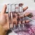 Import bulk private labeling crystal gloss vegan brown nude organic liquid clear lipgloss from China
