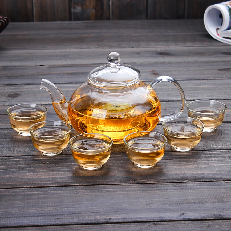 China kongfu tea set clear glass tea pot with cups warmer