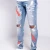 Import Edge Denim China Factory Summer Autumn Men Stretchy Destroyed Red Paint  Denim Jeans Pants Fashion Skinny Fit from China
