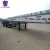 Import Flatbed Truck Trailers 20 40 45 48 Feet Extendable Container Chassis Semitrailer 100ton 3 Axle Flatbed Semi Trailers price from China