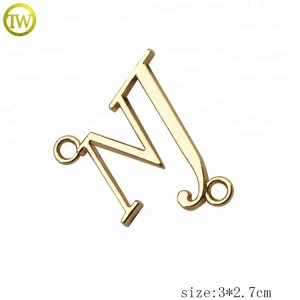 Gold color clothing metal label sewing letter accessories tag by guangzhou factory
