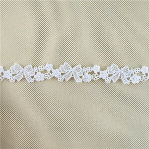 Lovely embroidery design small white polyester nigeria guipure lace trim for wedding decoration