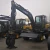 Import new stype mechanical LG685BM wheel excavator with grab from Pakistan