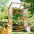 Import Price Small Mini Cedar Wood Garden Greenhouse for Sale from China