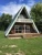 Import Steel frame prefab house huts resort cottage home garden chalet wood log cabin kits A frame mini house from China