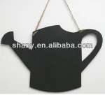 Watering can hanging blackboard