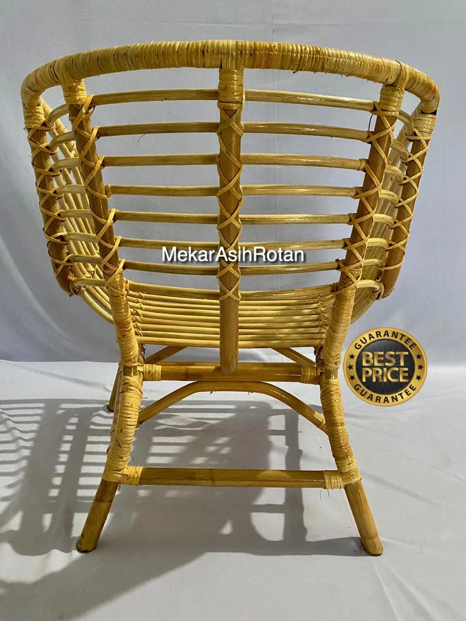 Wholesale Buskbo natural bamboo look Indonesian cane rattan wood lazy chair rattan for living room leisure hotel furniture