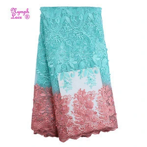 2018 guangzhou 100% polyester wedding net dubai tulle swiss embroidery french beaded dress 3d lace fabric african lace fabrics