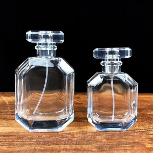 2021 hot Clear 50ml 100ml glass perfume bottle empty glass round perfume bottle with spray