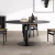 Import 2022  designer modern dinning room furniture modern luxury black rock plate dinning table and chairs from China