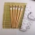 Import Bamboo sushi tool set sushi mat rice spoon chopsticks set from China