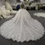 Import Latest design crystal bead trailing bridal gown ivory lace simple wedding dress with long sleeve from China