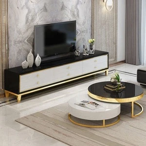 Modern glass top polished stainless steel base gold coffee table