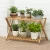 Import Outdoor Simple Design Wood Bamboo Adjustable Flower Plant Stand from China
