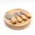 Import Rubber wood round shape 4pcs cheese cutting board knife set for gift from China
