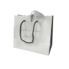 White Recyclable Shopping Paper Bags with Custom Silver Stamping Logo for Gift Giving