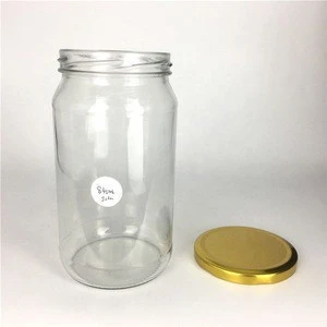 Wholesale 840ml empty round glass food storage jar for jam honey pickles jar with lid