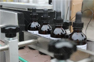 CBD oil glass dropper bottle sticker RLB labeling machine RELIANCE
