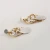 Import Industrial Novelty Black Gold Plated Triangle Body 3 Loops Cheetah Metal Stone Pearl Earrings from China
