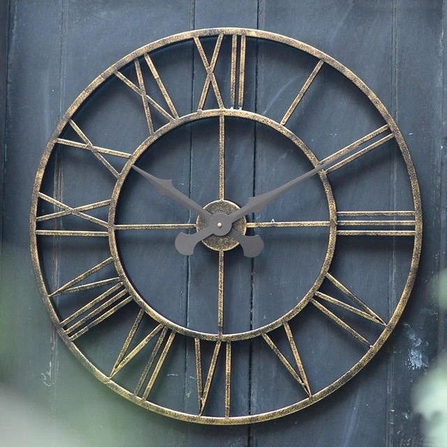 Large vintage style skeleton frame French garden clock.