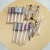 Import Low MOQ Pick your own colors and customized lip gloss tube liquid glitter clear glossy private label lip gloss from China