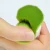 Import Private Design Sunny Doll Shape Soft Green Hair Facial Cleansing Brush With Bracket from China