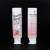 Import Removable Plastic Cosmetic Tube with Silicone Brush Applicator for Facial Cleanser/Body Lotion from China