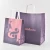 Import 2021 New design Cheap custom printed shopping paper bag with handle from China
