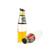 Amazon Hot Sale 500ml Kitchen Oil Vinegar Glass Bottle with Press Measure